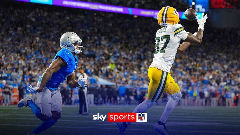 Green Bay Packers wide receiver Romeo Doubs (87) makes a catch in front of Detroit Lions cornerback D.J. Reed (4) for a touchdown during the first half an NFL football game in Detroit, Thursday, Nov. 27, 2025. 