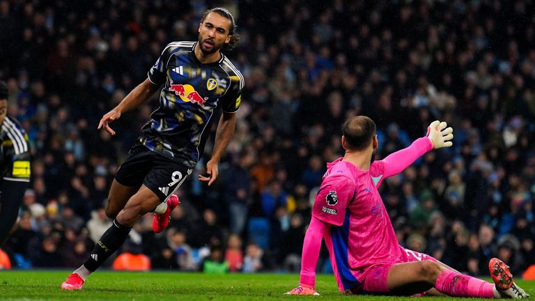 Dominic Calvert-Lewin wheels away to celebrate after pulling a goal back for Leeds at the Etihad