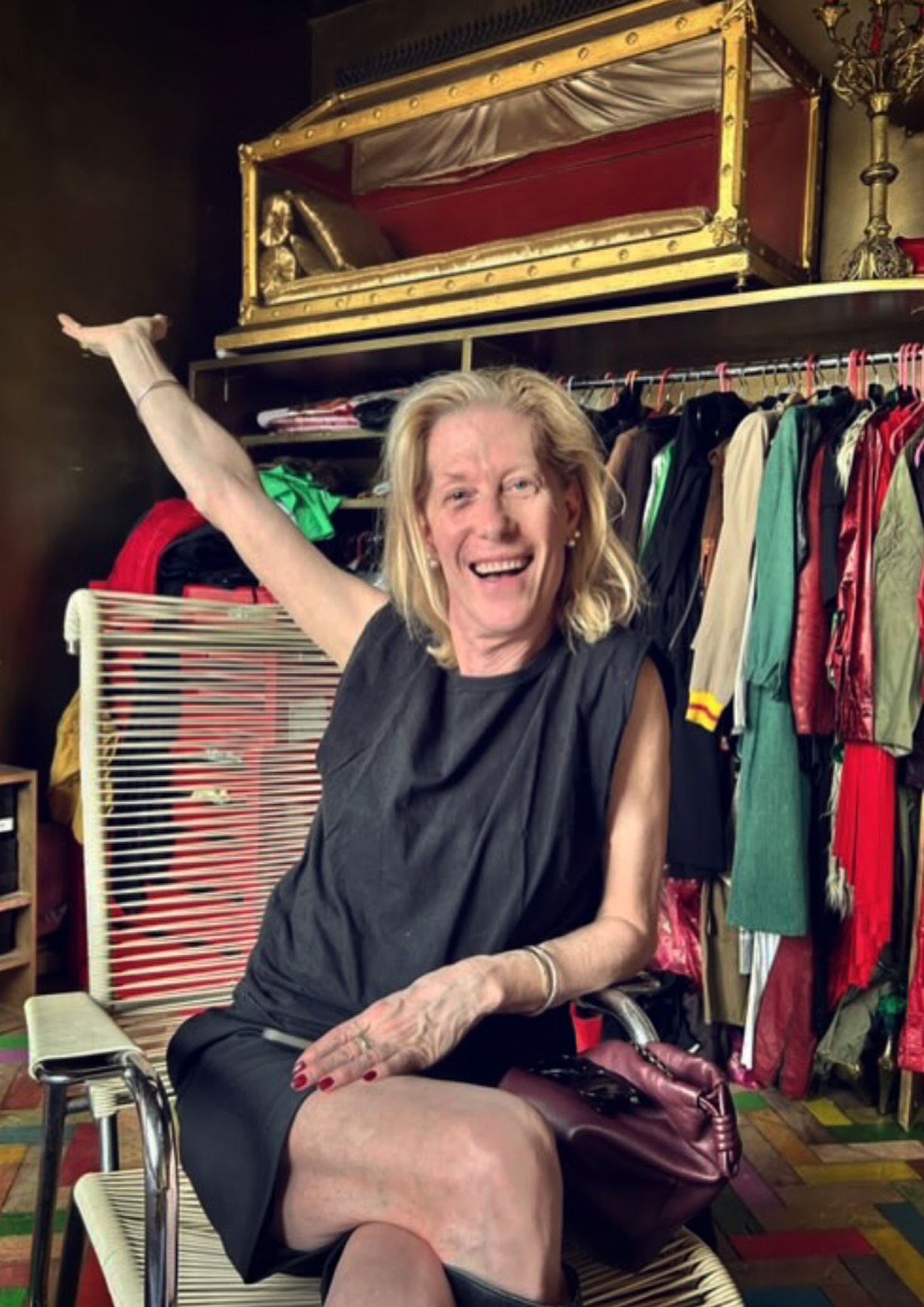 Justin Vivian bond in front of Pam Hogg's coffin