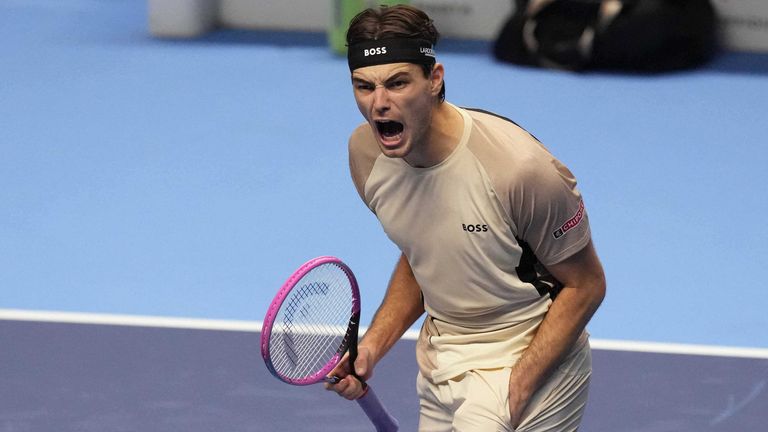  Taylor Fritz celebrates after winning against Italy's Lorenzo Musetti during the ATP World Tour Finals, 2025. (AP Photo/Antonio Calanni)