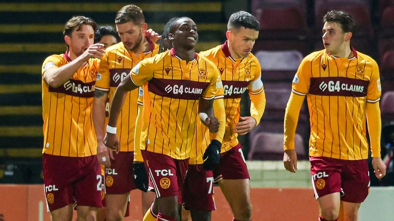 Motherwell's Tawanda Maswanhise (centre) celebrates scoring a penalty to make it 1-0 