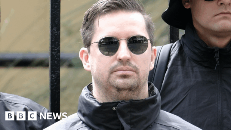 South African man seen at neo-Nazi rally has Australian visa revoked