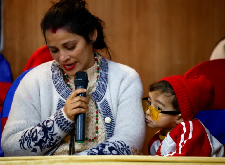 Tina Ghimire, wife of Padam Ghimire, speaks to members of the media about her husband, who is in Russia, as families of Nepali nationals who have been recruited by the Russian army to fight against Ukraine pleaded for their safe return, in Kathmandu, Nepal February 2, 2024. REUTERS/Navesh Chitrakar