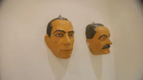 US Congress Image shows two of the masks on a wall
