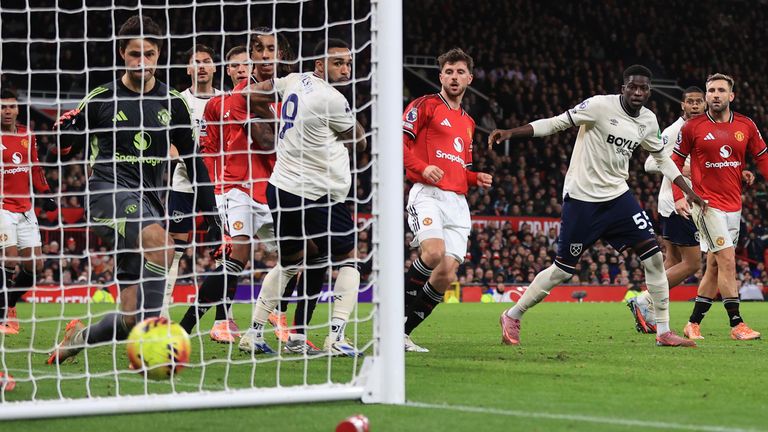 Soungoutou Magassa looks on as his shot heads into the back of the net for West Ham's equaliser against Man Utd