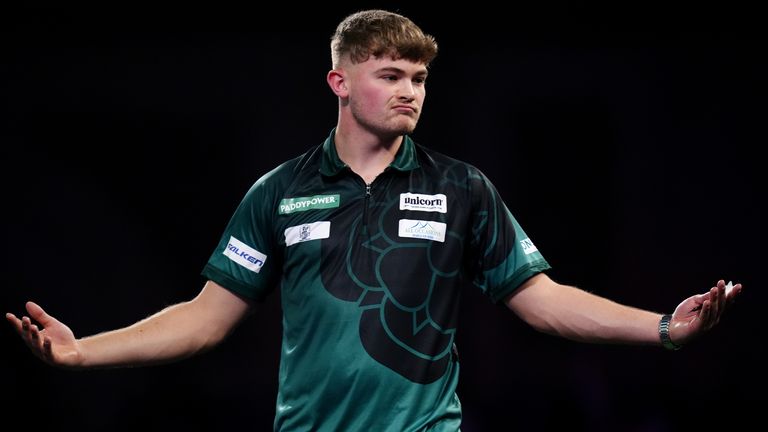 Charlie Manby reacts during his match against Cameron Menzies on day five of the Paddy Power World Darts Championship at the Alexandra Palac