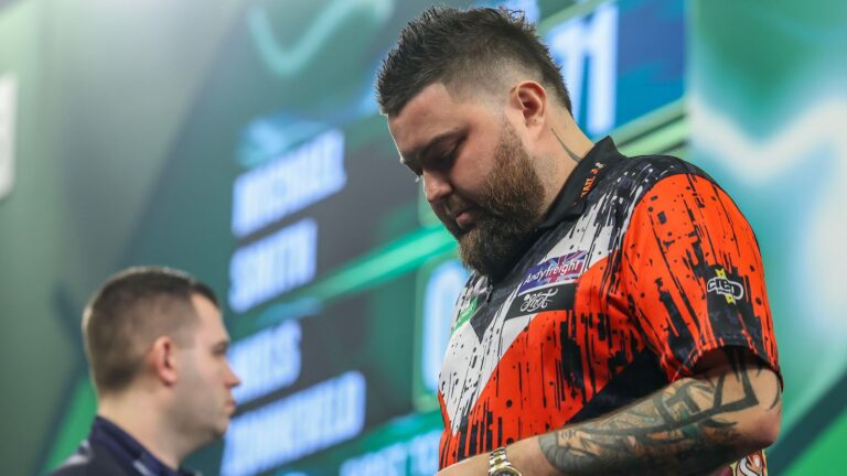 World Darts Championship: Former winner Michael Smith sent packing as ‘People’s Champion’ Stephen Bunting marches through to third round | Darts News