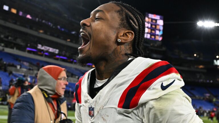 NFL: New England Patriots clinch playoff spot with 28-24 comeback win over Baltimore Ravens as Lamar Jackson suffers back injury | NFL News