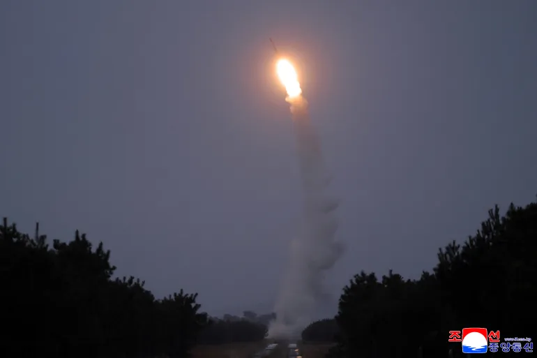 A long-range surface-to-air missile is test-fired near the East Sea, December 24, 2025 in this picture released by North Korea's official Korean Central News Agency on December 25, 2025. KCNA via REUTERS ATTENTION EDITORS - THIS IMAGE WAS PROVIDED BY A THIRD PARTY. REUTERS IS UNABLE TO INDEPENDENTLY VERIFY THIS IMAGE. NO THIRD PARTY SALES. SOUTH KOREA OUT. NO COMMERCIAL OR EDITORIAL SALES IN SOUTH KOREA.