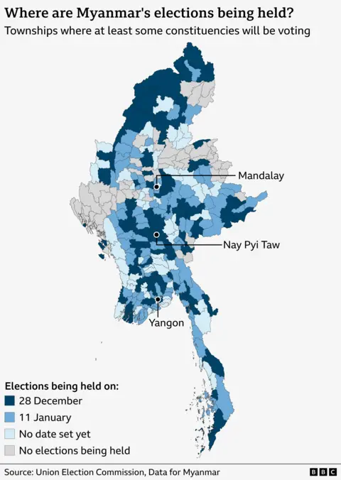A map of Myanmar with a title of "Where are Myanmar's elections being held?” and a subtitle of "About 30% of townships will vote in first phase of elections”. It shows all of the country's 330 townships and colours them by their election status: Light blue areas represent townships voting on 28 December (102 townships), blue represents those voting on 11 January (100 townships), light blue indicates places where no election date is set yet (72 townships), and grey areas show where no elections are being held (56 townships). The cities of Mandalay in the north, Nay Pyi Taw in the centre, and Yangon in the south are labelled. The source is given as the Union Election Commission and Data for Myanmar