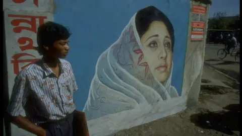 Getty Images A campaign poster for Khaled Zia in the 1991 election