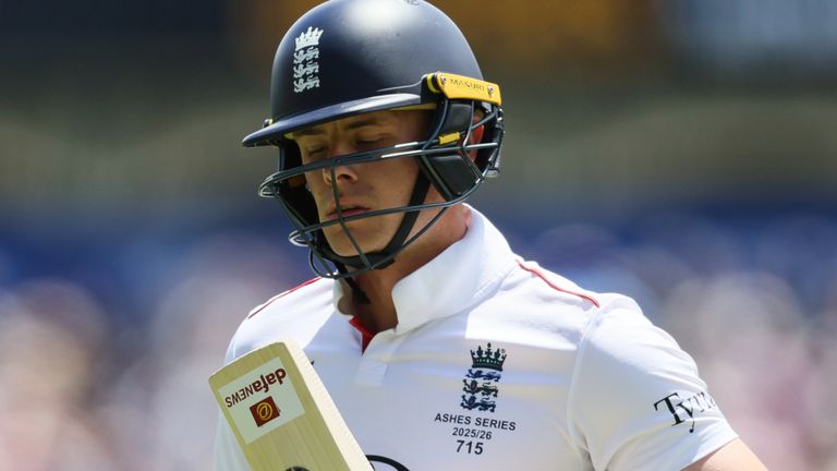 England's Jamie Smith walks from the field after he was dismissed during play on the final day of the third Ashes cricket test between England and Australia in Adelaide, Australia, Sunday, Dec. 21, 2025. (AP Photo/James Elsby)