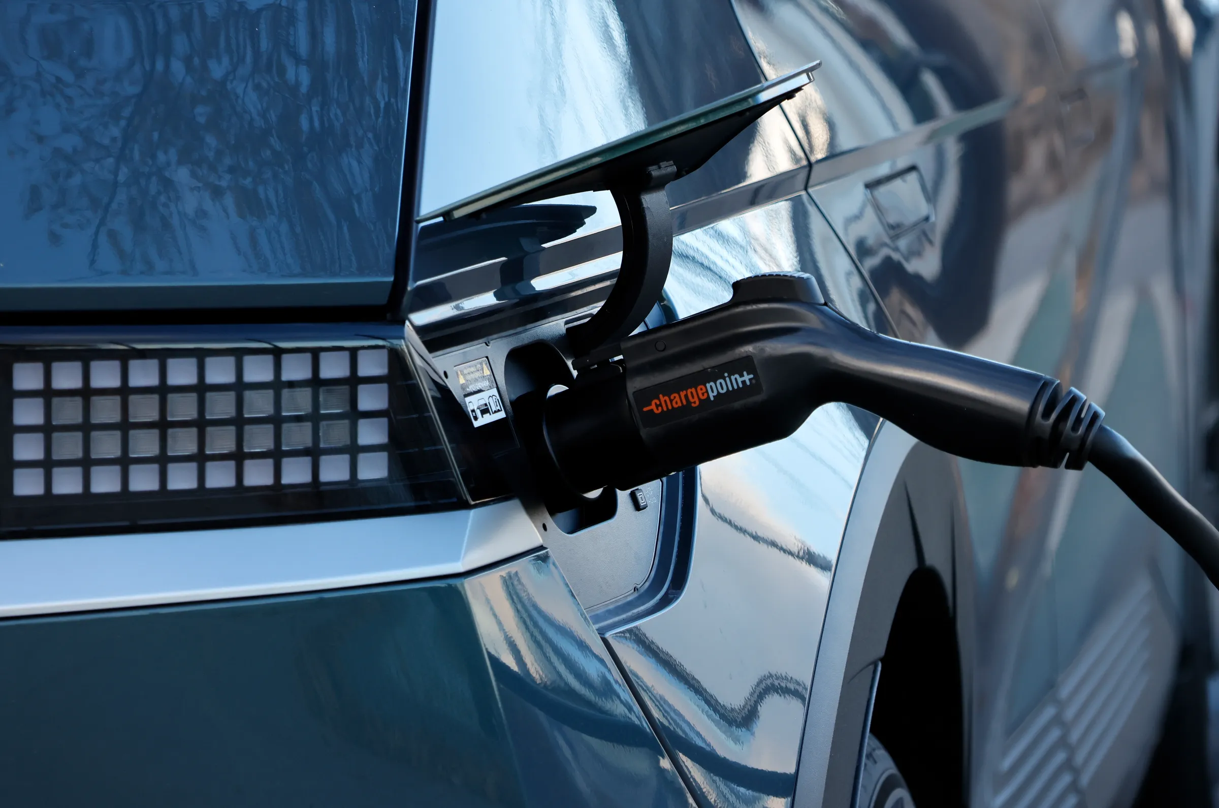 A car at an EV charger