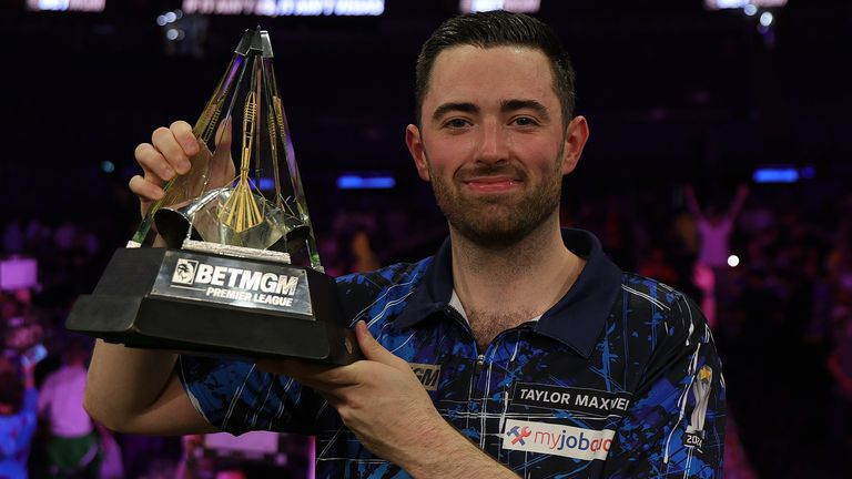 LONDON, ENGLAND - MAY 29: Luke Humphries of England poses with the trophy after winning The Final of the 2025 BetMGM Premier League Darts Play-Offs at The O2 Arena on May 29, 2025 in London, England. (Photo by Andrew Redington/Getty Images)