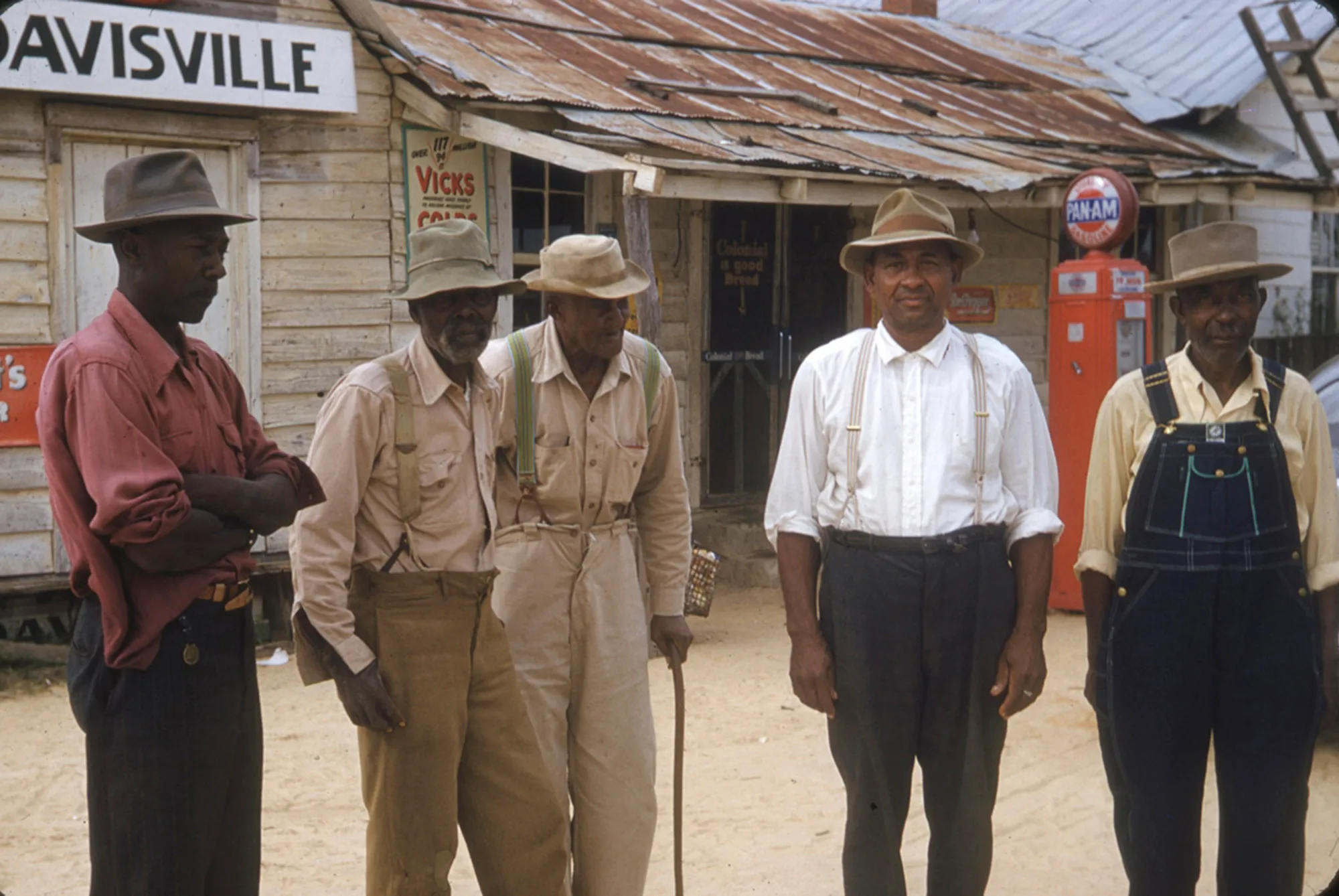 Older Black men included in a syphilis study stand for a photo.