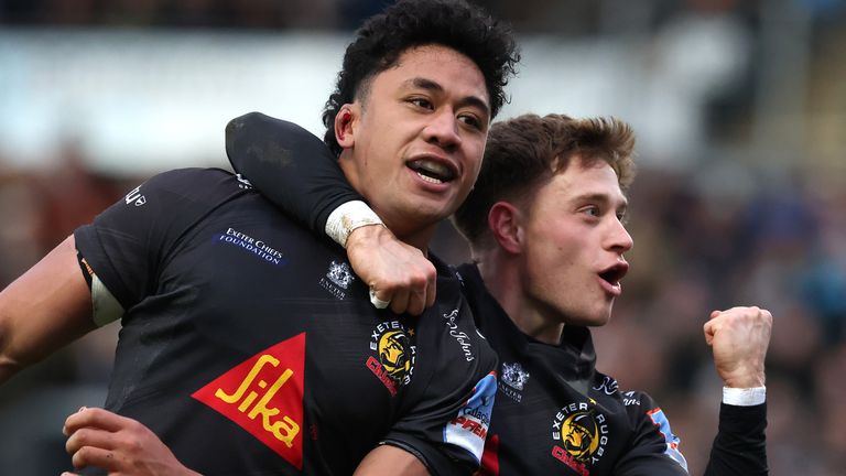Greg Fisilau (L) celebrates with team mate Stephen Varney during Exeter's win over Leicester 