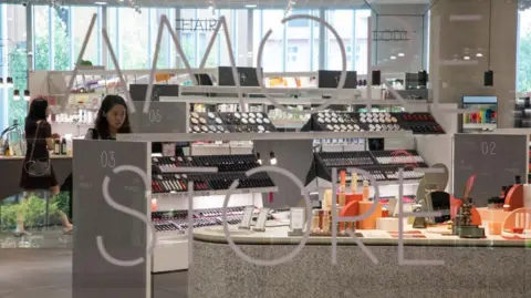 Getty Images Customers browse Amorepacific Corp. cosmetics at the store in the company's headquarters in Seoul, South Korea, on Wednesday, Sept. 12, 2018.