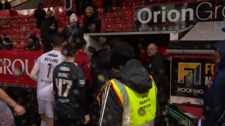 Raskin squirts water at Aberdeen fan in full-time flashpoint