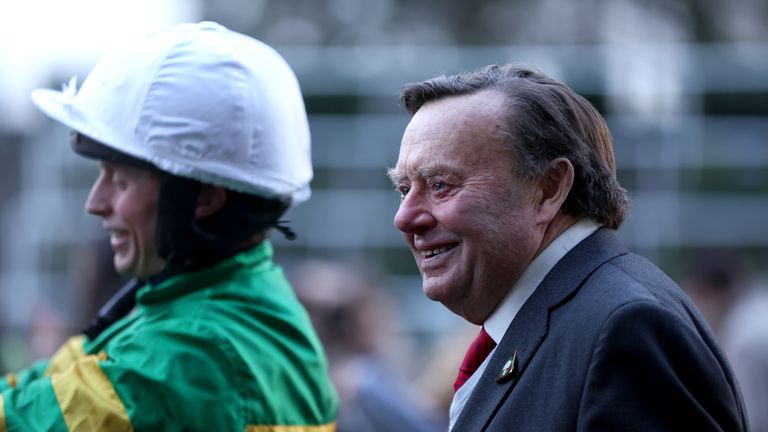 Nicky Henderson all smiles as he looks on after Jonbon's Clarence House Chase success