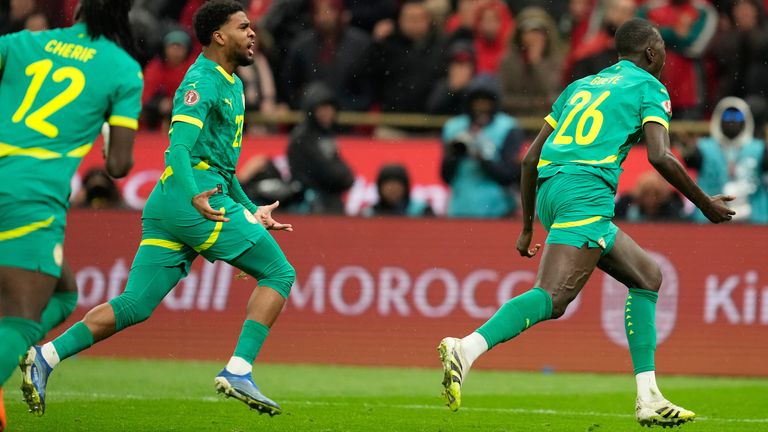 Senegal's Pape Gueye celebrates after scoring 
