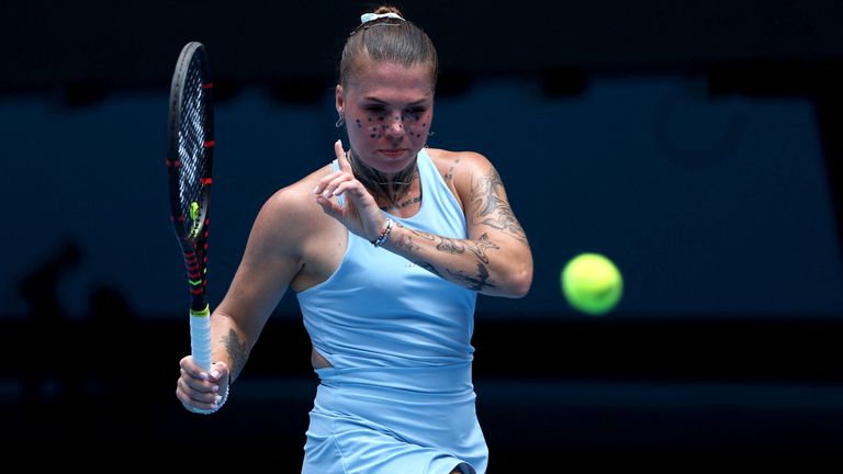 Ukraine's Oleksandra Oliynykova reacts on a point to USA's Madison Keys during their women's singles match on day three of the Australian Op