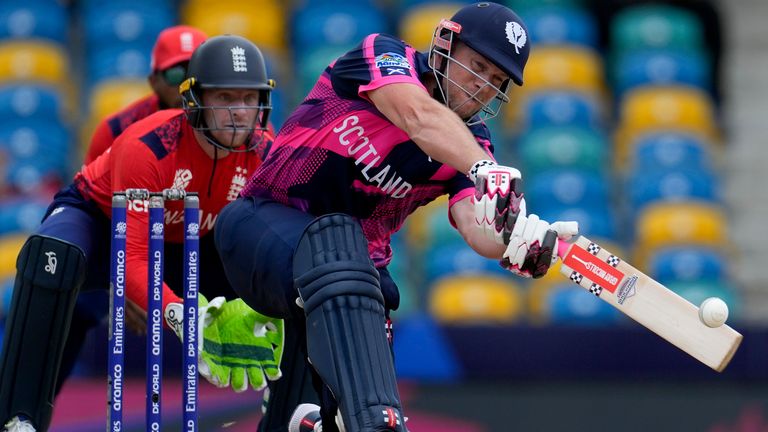 Scotland's George Munsey plays a shot from a delivery of England's Moeen Ali during an ICC Men's T20 World Cup cricket match at Kensington Oval in Bridgetown, Barbados, Tuesday, June 4, 2024. (AP Photo/Ricardo Mazalan)