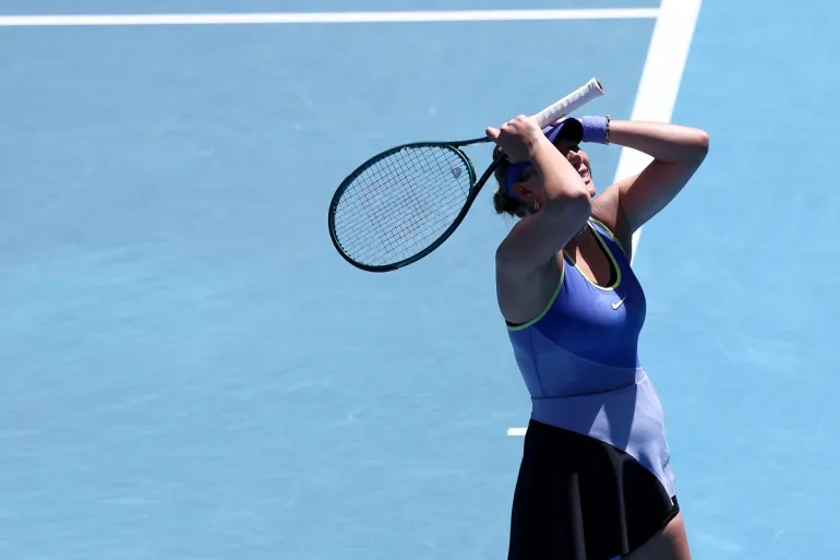 USA's Amanda Anisimova reacts on a point to compatriot Jessica Pegula during their women's singles quarter-final match on day eleven of the Australian Open tennis tournament in Melbourne on January 28, 2026. (Photo by IZHAR KHAN / AFP) / -- IMAGE RESTRICTED TO EDITORIAL USE - STRICTLY NO COMMERCIAL USE --