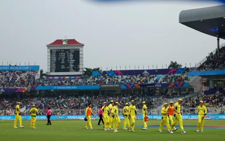 Cricket - ICC Cricket World Cup 2023 - Semi-Final - South Africa v Australia - Eden Gardens, Kolkata, India - November 16, 2023 Australia players during a rain delay REUTERS/Andrew Boyers