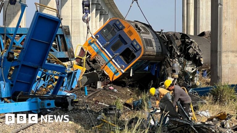 At least 32 dead after construction crane falls on train