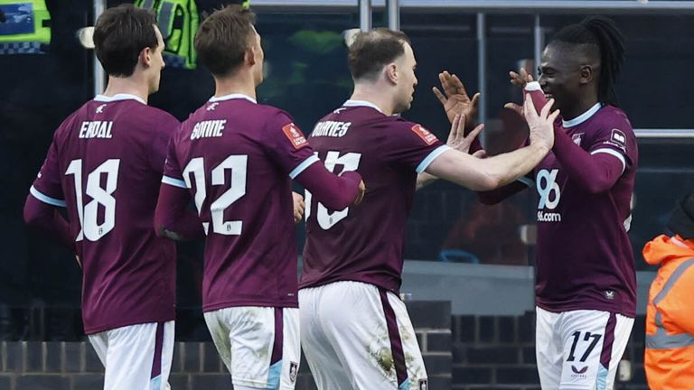 Loum Tchaouna celebrates with his team-mates after scoring Burnley's second goal against Millwall