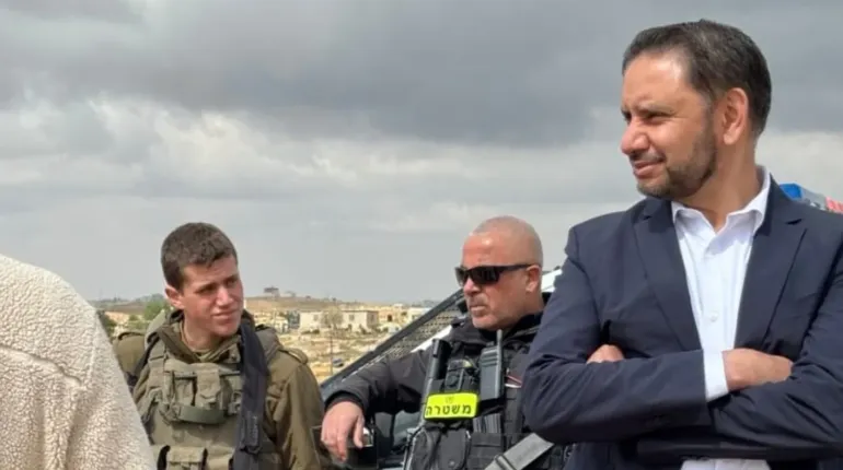 The author in Masafer Yatta, occupied west Bank, while being confronted by Israeli soldiers and armed settlers [Courtesy of Shockat Adam]