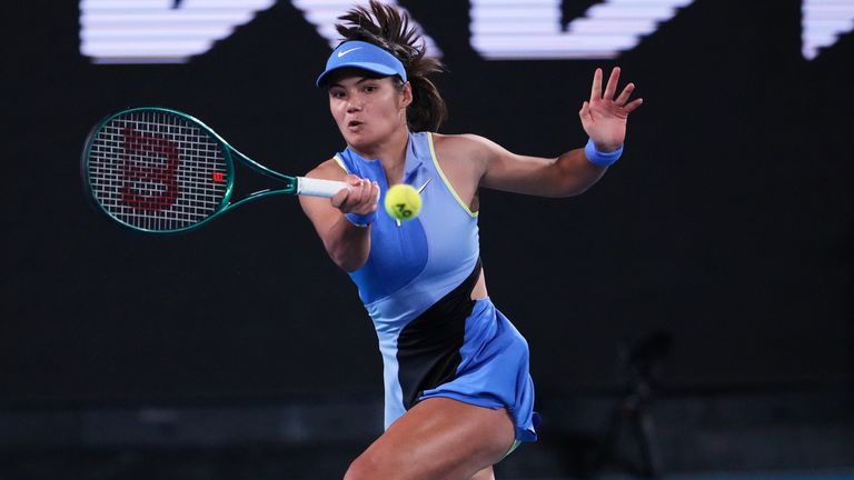 Emma Raducanu of Britain plays a forehand return to Mananchaya Sawangkaew of Thailand during their first round match at the Australian Open 