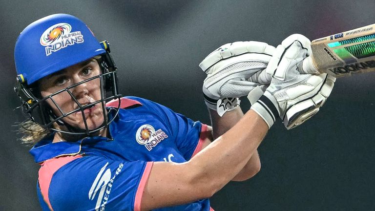 Mumbai Indians' Nat Sciver-Brunt plays a shot during the Women's Premier League (WPL) T20 match between Mumbai Indians and Delhi Capitals