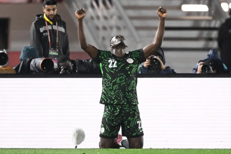 Nigeria's forward #22 Akor Adams celebrates scoring the team's fourth goal during the Africa Cup of Nations (CAN) round of 16 football match between Nigeria and Mozambique