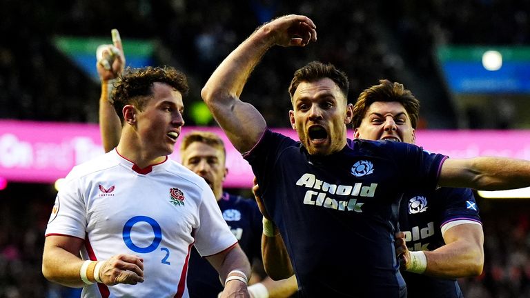 Scotland's Ben White (centre left) celebrates scoring their third try 