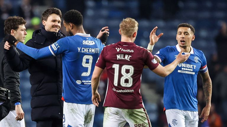 Rangers head coach Danny Rohl (L) and Youssef Chermiti embrace at full time 