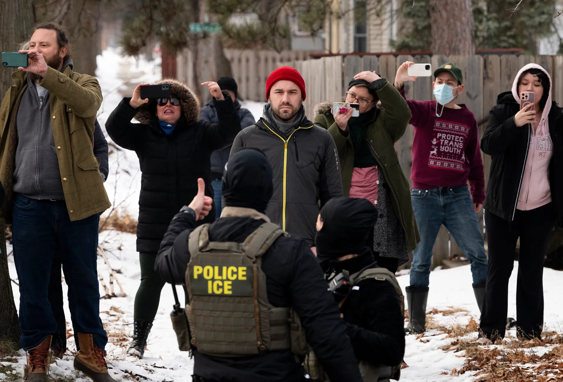 Observers film ICE agents on February 5, 2026, in Minneapolis, Minnesota. Protests continue calling for an end to immigration raids in the Twin cities which have already resulted in the fatal shooting deaths of Alex Pretti, a VA nurse, and Renée Good, a mother of three, by federal agents.