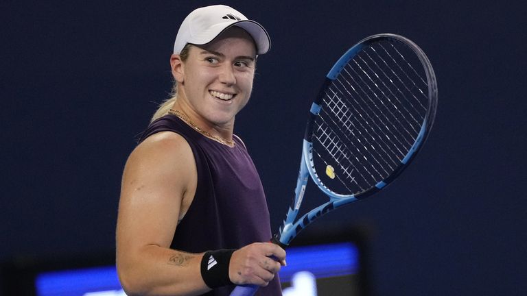 Sonay Kartal, of Britain reacts after defeating Mirra Andreeva in the women's singles match of the China Open tennis tournament, at the National Tennis Center, in Beijing, Wednesday, Oct. 1, 2025. (AP Photo/Andy Wong)