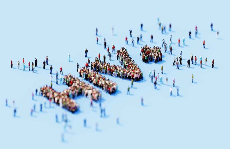 Human crowd forming HIV+ on blue background. Horizontal composition with copy space.