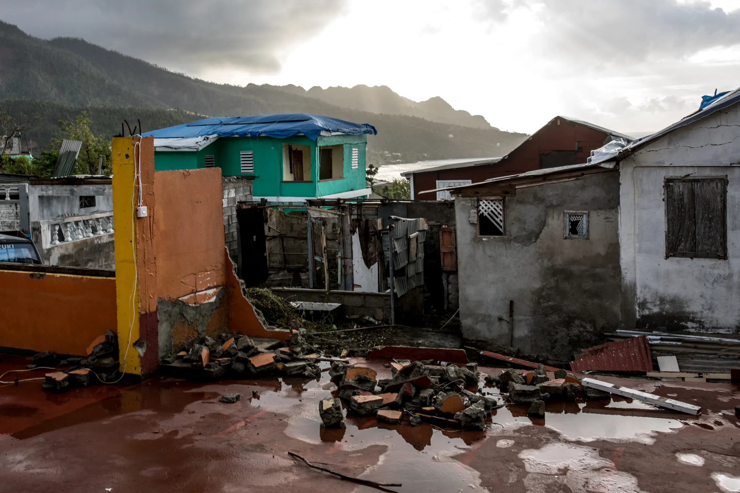 A house damaged by Hurricane Maria stands in Grand Bay, Dominica, on Thursday, May 10, 2018.