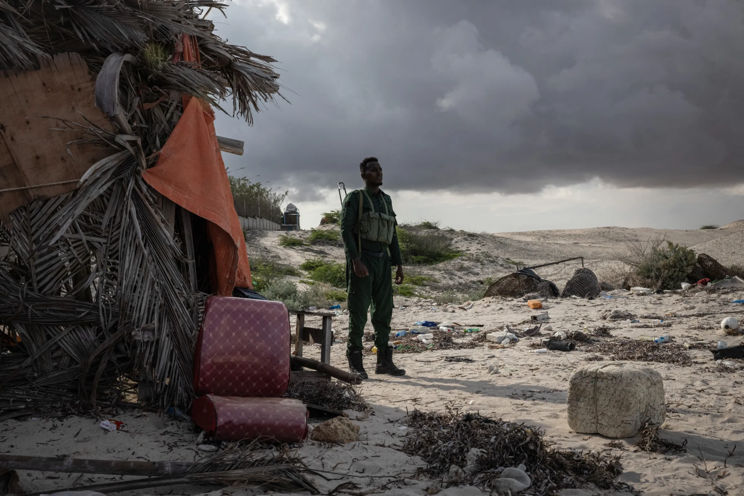A man stands on a beach
