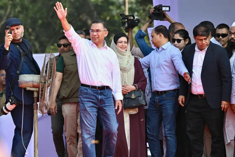 Bangladesh Nationalist Party (BNP) chairman Tarique Rahman (3L) waves to supporters during a rally as he begins campaigning ahead of the upcoming national election, in Sylhet on January 22, 2026.