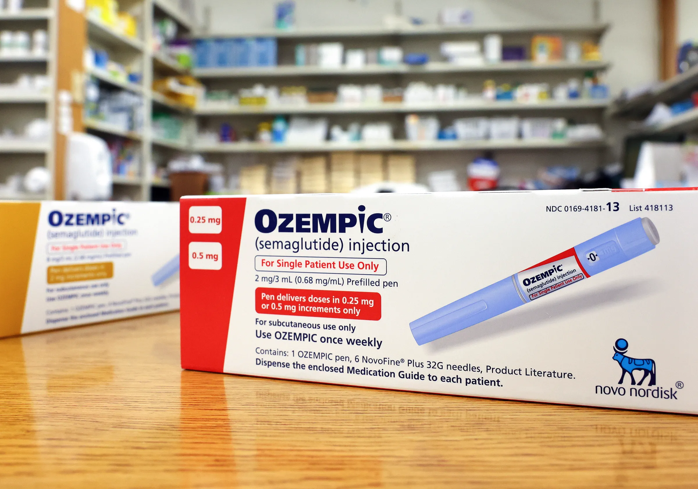 An Ozempic injection box on a pharmacy counter.