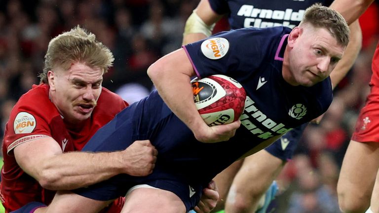 Finn Russell scores a try for Scotland against Wales