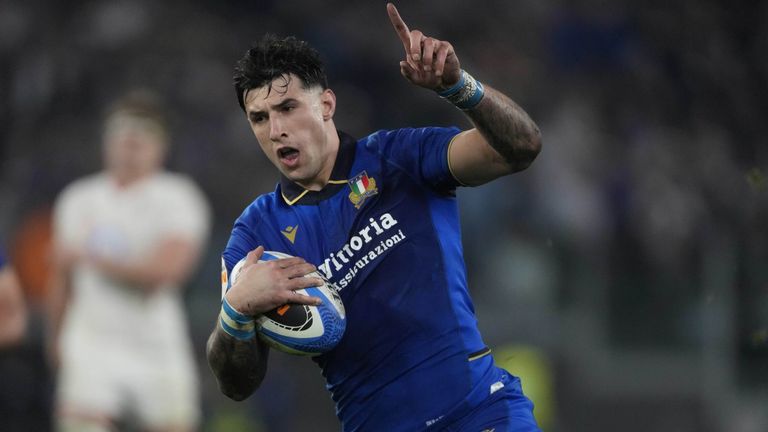 Tommaso Menoncello celebrates before scoring Italy's opening try against England
