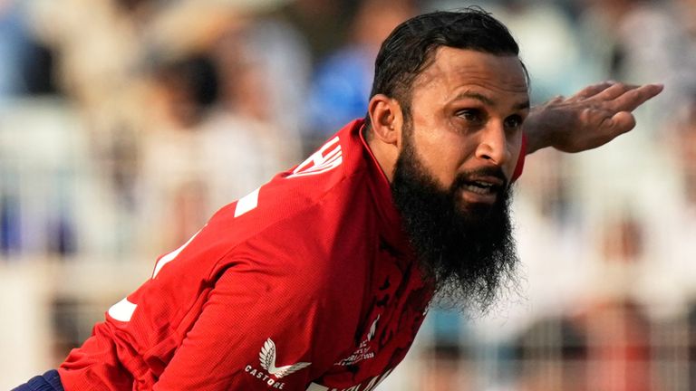 England's Adil Rashid bowls a delivery during the T20 World Cup cricket match between England and Scotland (AP)  