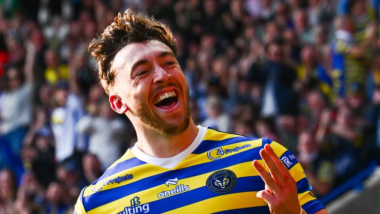 Picture by Olly Hassell/SWpix.com - 21/03/2026 - Rugby League - Betfred Super League Round 5 - Warrington Wolves v Castleford Tigers - Halliwell Jones Stadium, Warrington, England - Matty Ashton of Warrington celebrates his third try of the match