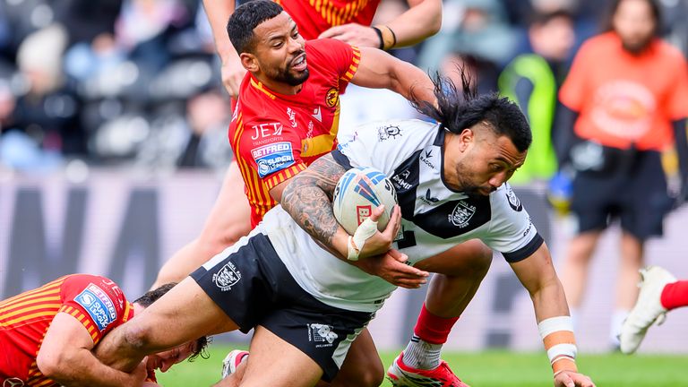 Picture by Allan McKenzie/SWpix.com - 29/03/2026 - Rugby League - Betfred Super League Round 6 - Hull FC v Catalans Dragons - MKM Stadium, Kingston upon Hull, England - Hull FC's Ligi Sao is tackled by Catalans' Kruise Leeming just short of the goal line.
