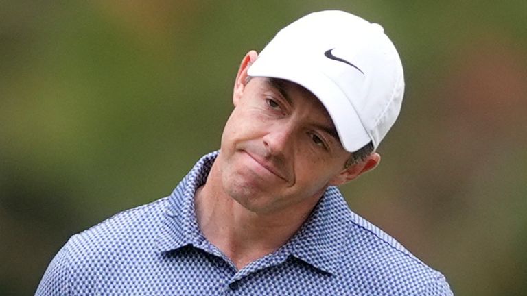 Rory McIlroy of Northern Ireland reacts to his putt on the first green during the first round of The Players Championship