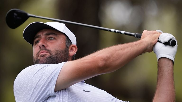 Scottie Scheffler hits his tee shot on the 12th hole during the first round of The Players 